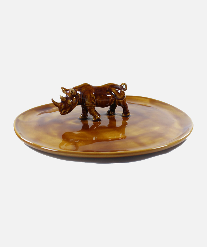 Teller mit Nashornfigur